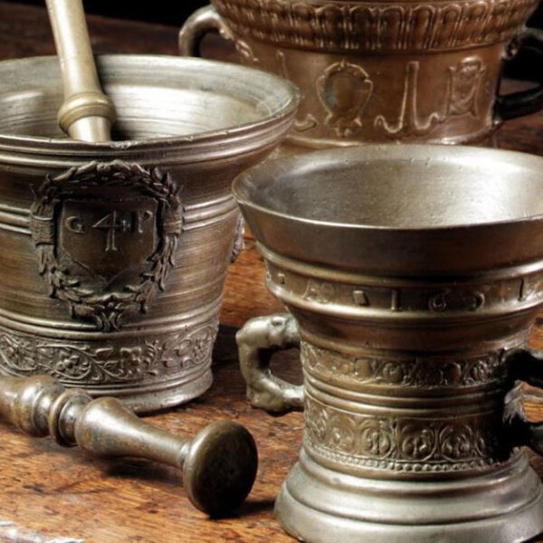 A table with two mortar and pestle on it